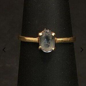 10k blue topaz gold band